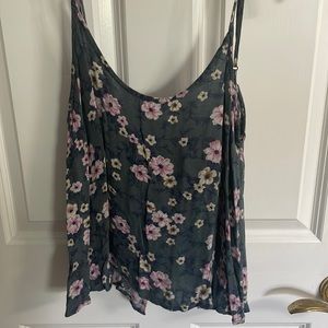 American Eagle flowy tank top with slight open back. Grey/blue/prpl/pink floral